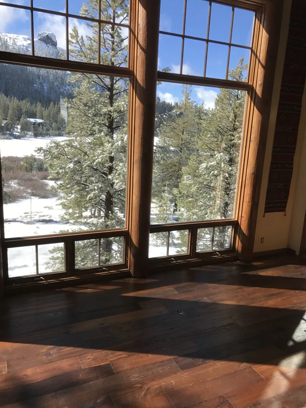 Mountain cabin hardwood flooring installation in Kirkwood Village