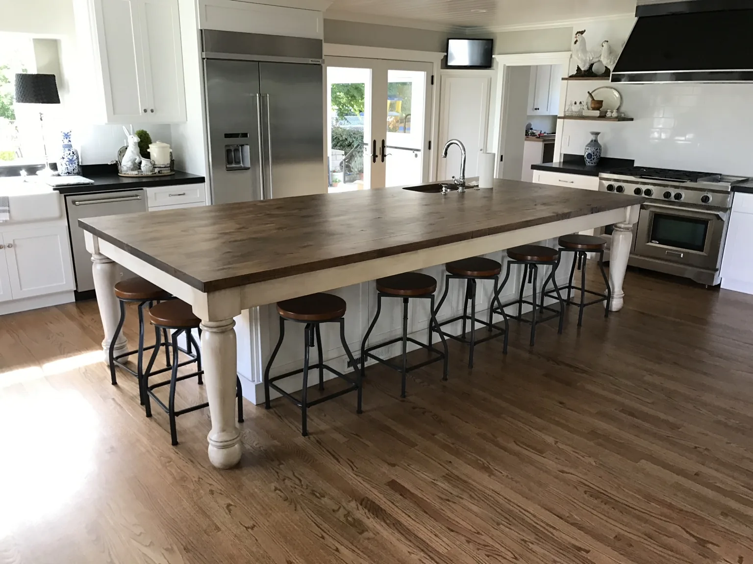Custom lace-in hardwood floor in a Linden kitchen