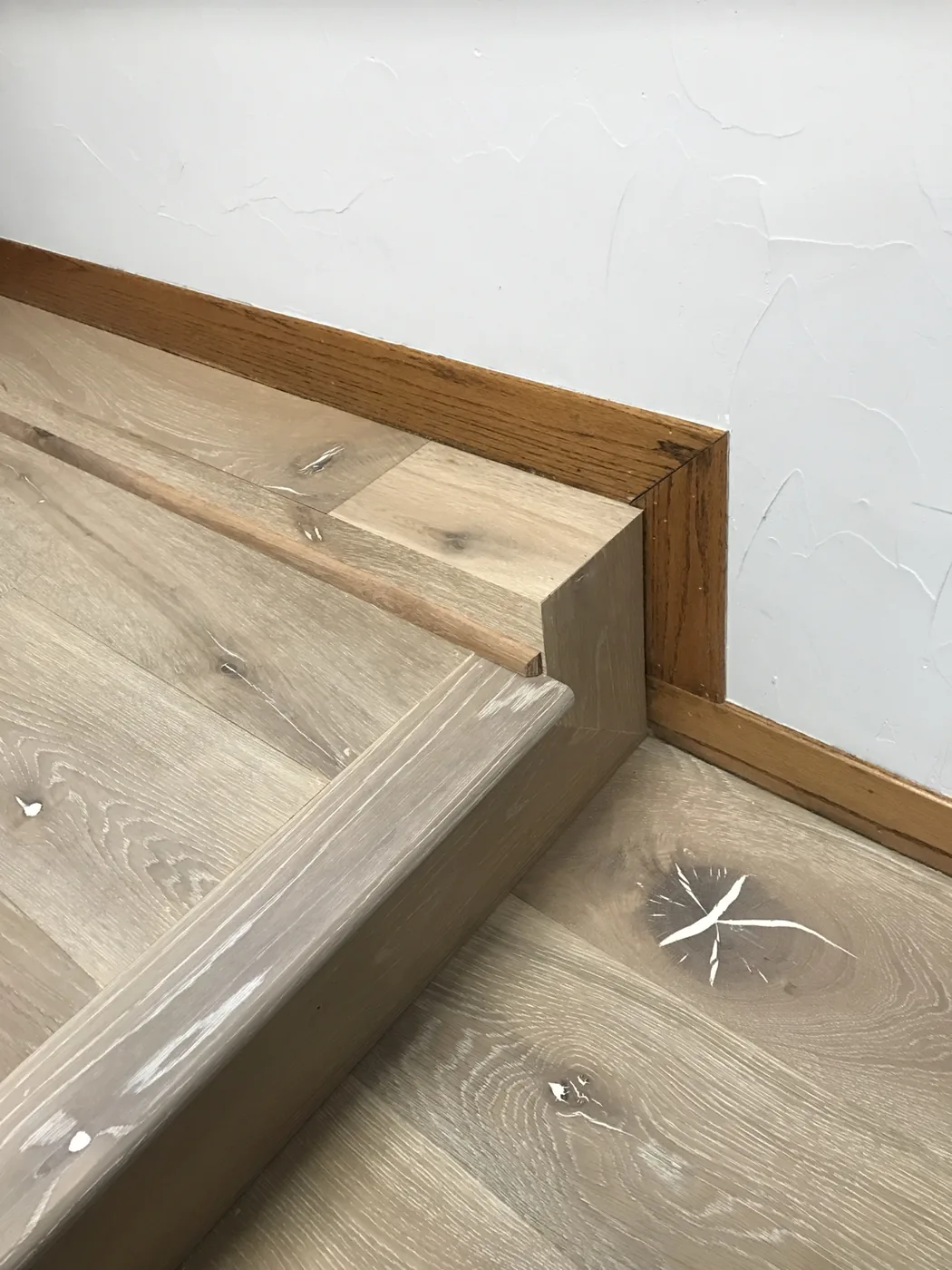 Custom prefinished hardwood step and landing detail